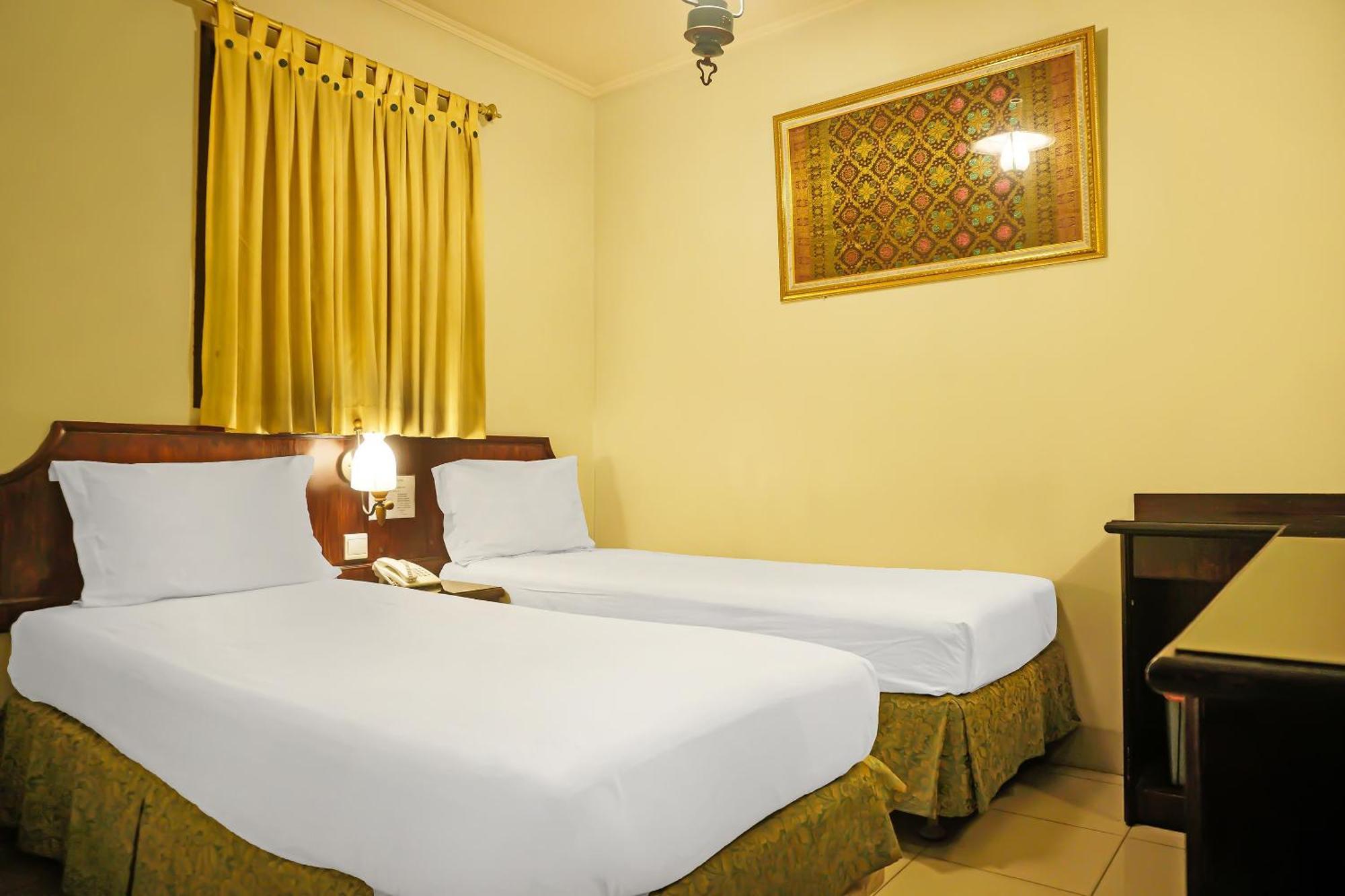 Super Oyo Collection O 92690 Hotel Limas Palembang Exterior photo